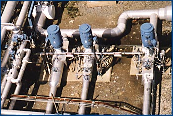 Motors and piping for deep well pumps handling refrigerated LPG